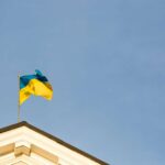 Ukrainian flag on top of a government building