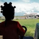 bimba in aeroporto