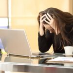 Desperate,Businesswoman,On,Line,Worried,After,Bankruptcy,In,Front,Of